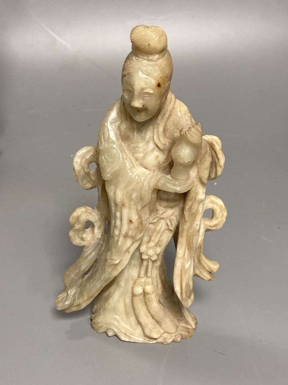 A group of Chinese soapstone, hardstone carvings and wood stands, 19th/20th century
